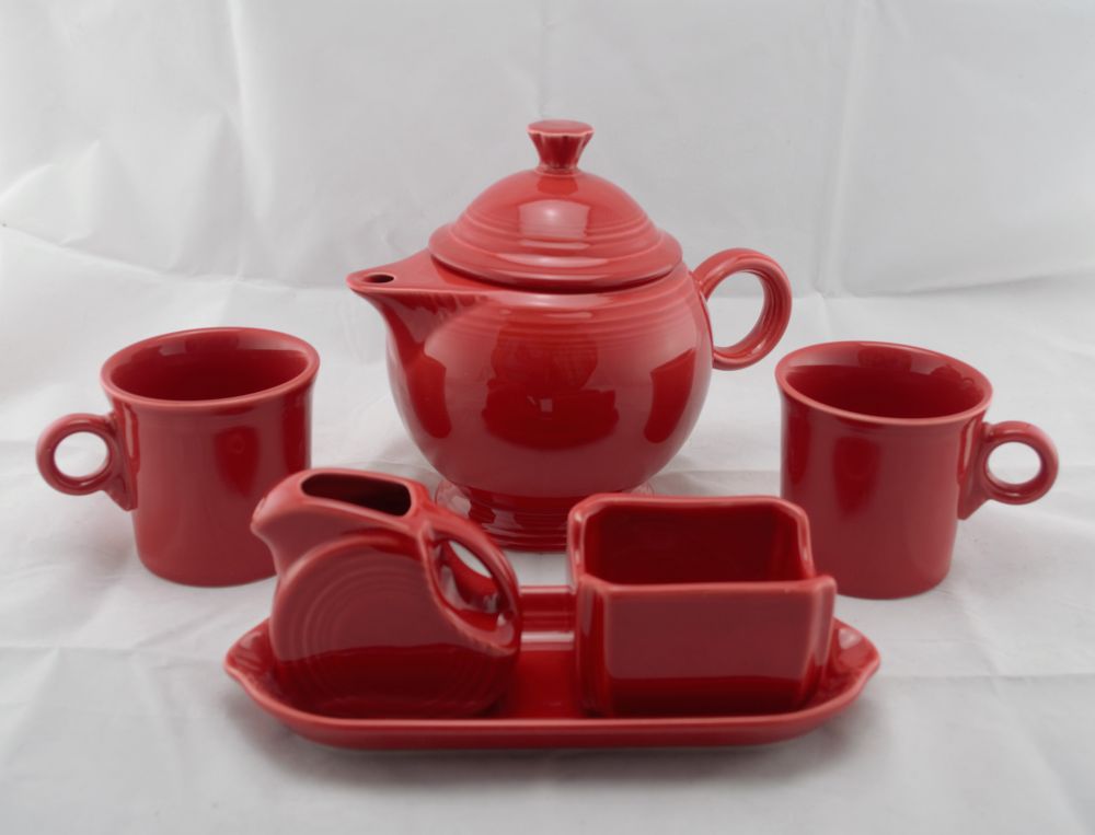https://fiestaspecialties.com/media/catalog/product/cache/7af62008e4c7fadfa470f47be78ceeda/1/0/1008--scarlet-tea-set_--lg.teapot-44oz.-_-mini-creamer--sugar-caddy-tray-set-w-2-deco-handle-mugs-currant-color.jpg